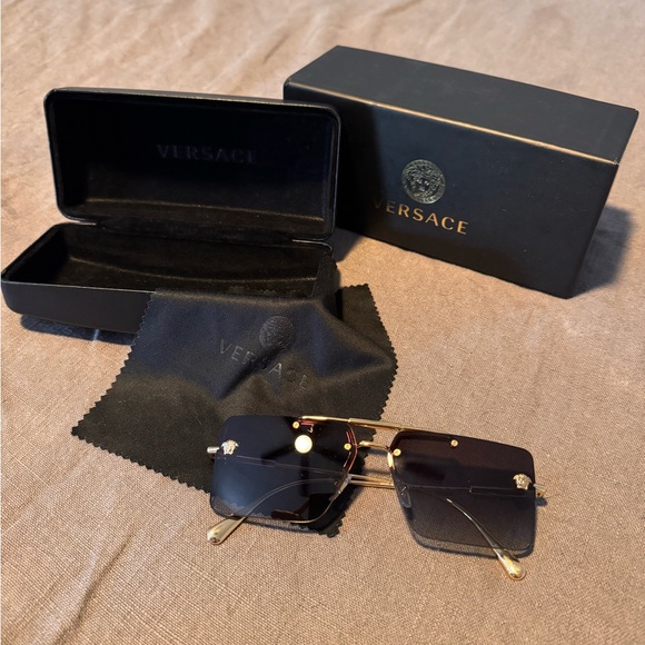 Versace Gold and Black Rimless Sunglasses